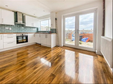 Finished lounge with hardwood flooring by DR Smith Building general builders.