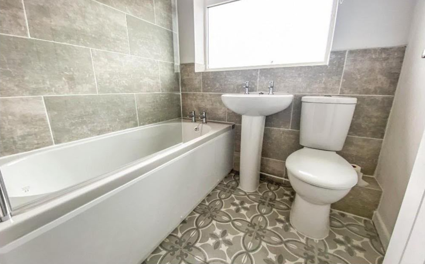 Completed tiled bathroom refurbishment by DR Smith Building, Highworth.